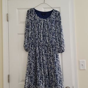 Navy and white patterned dress.